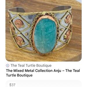 handcrafted cuff bracelet featuring a distinctive green copper patina finish